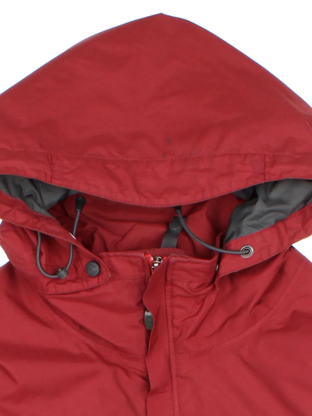 Nike ACG Coat in a red colourway with contrasting red and grey panelling. full zip up, hood and has multiple pockets, classic logo embroidered on the front.