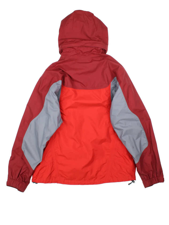 Nike ACG Coat in a red colourway with contrasting red and grey panelling. full zip up, hood and has multiple pockets, classic logo embroidered on the front.