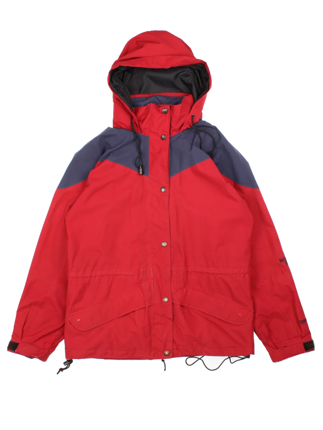 The North Face Coat in a red colourway with black panelling, full zip up and has multiple pockets, hooded and has the logo embroidered on the sleeve.