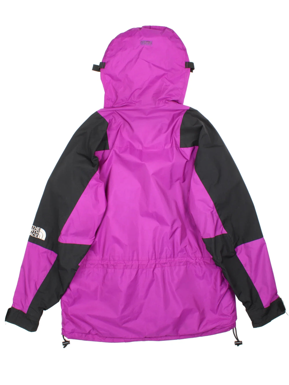 Vintage 90's The North Face Gore-Tex Mountain Jacket in a purple colourway with black panelling, full zip up and button up. multiple pockets, hood, drawstring hem and has the logo embroidered on the sleeve and front.