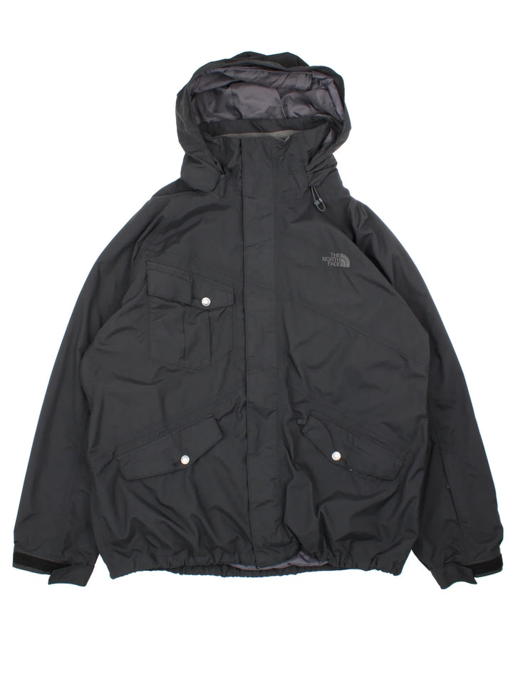 The North Face Coat in a black colourway which features, full zip up and has multiple pockets, hooded and has the logo embroidered on the front.
