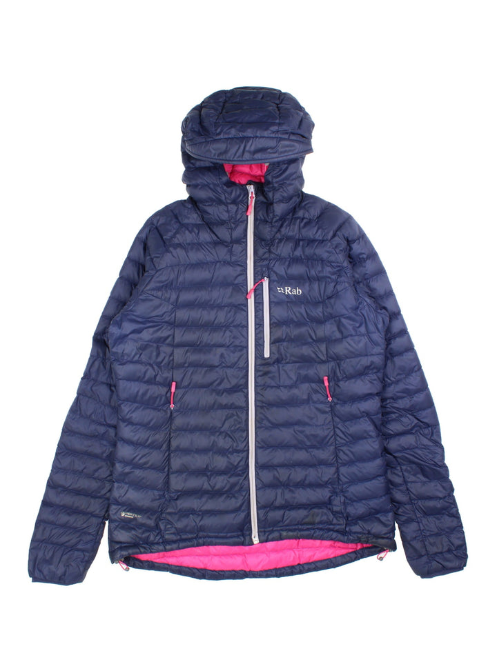 Vintage Rab Microlight Alpine Jacket in a blue colourway with contrast pink lining. Features hood, zip fastening/pockets and printed logo on the front.