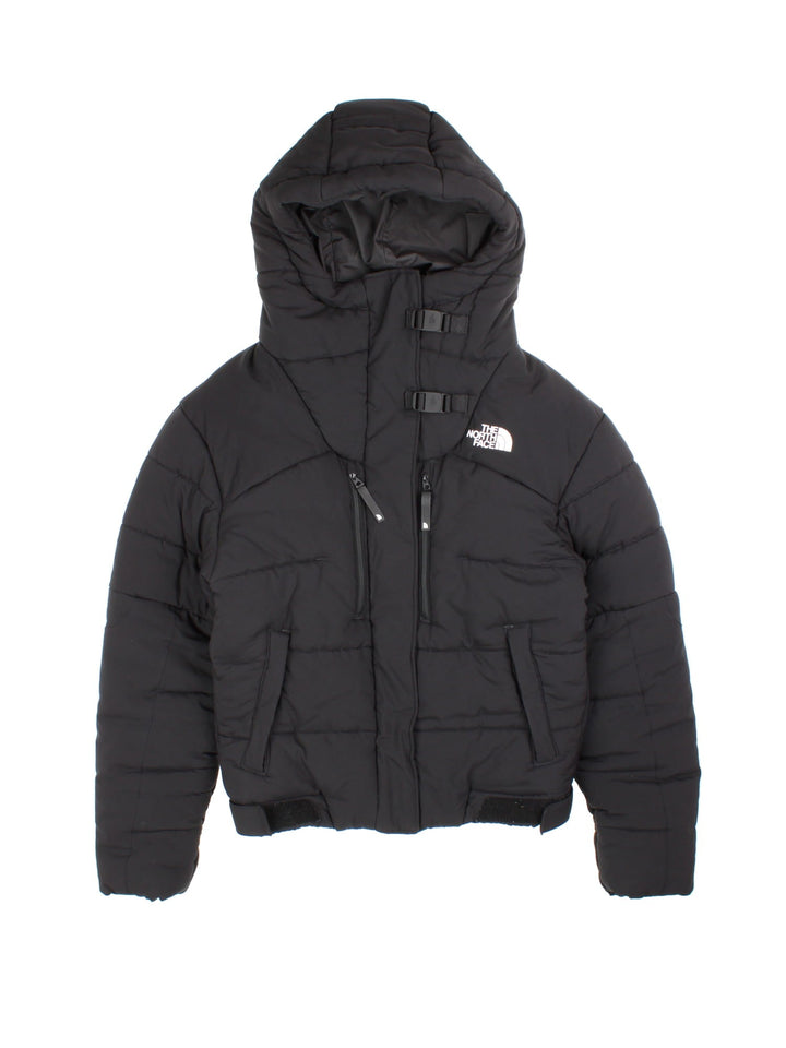Vintage The North Face Himalayan Jacket in a black colourway. Features hood, zip/velcro fastening, popper pockets and printed logo on the front.