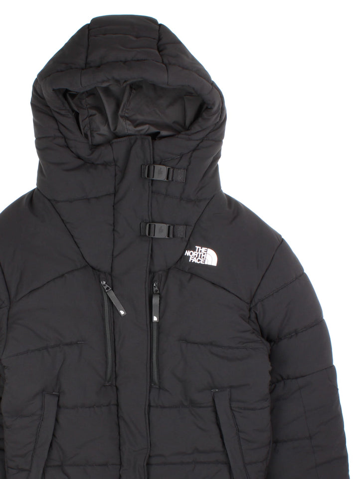 Vintage The North Face Himalayan Jacket in a black colourway. Features hood, zip/velcro fastening, popper pockets and printed logo on the front.