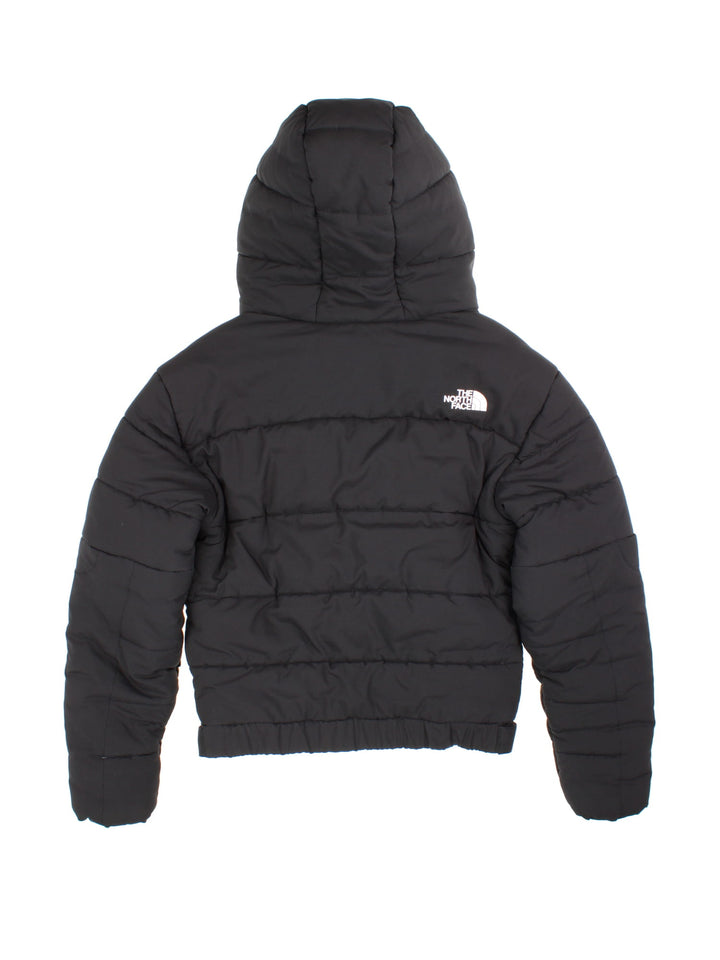 Vintage The North Face Himalayan Jacket in a black colourway. Features hood, zip/velcro fastening, popper pockets and printed logo on the front.
