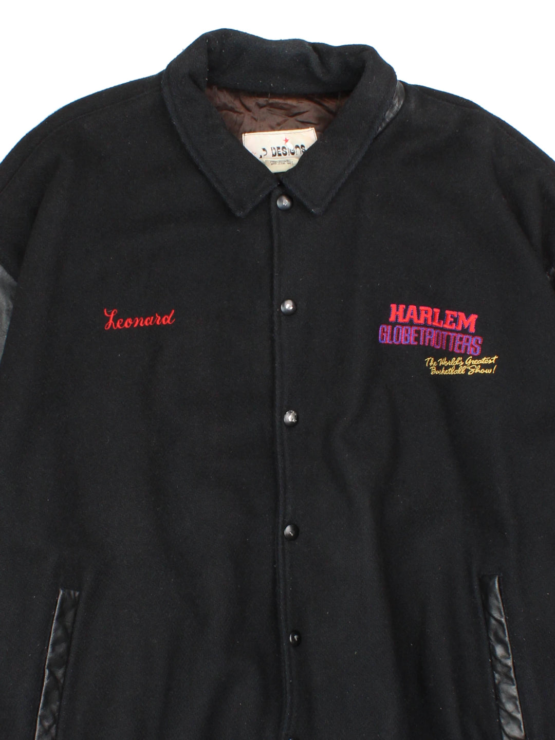 Vintage Harlem Globetrotters 'World Tour' varsity jacket by LP Designs, features embroidered name, badges and spell-out motif on the back