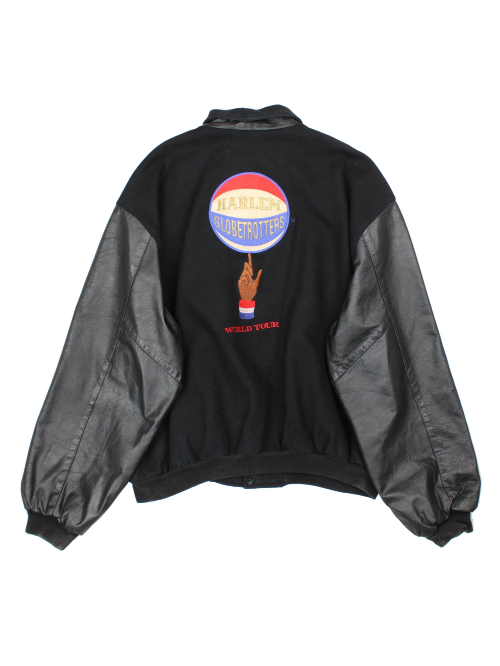 Vintage Harlem Globetrotters 'World Tour' varsity jacket by LP Designs, features embroidered name, badges and spell-out motif on the back