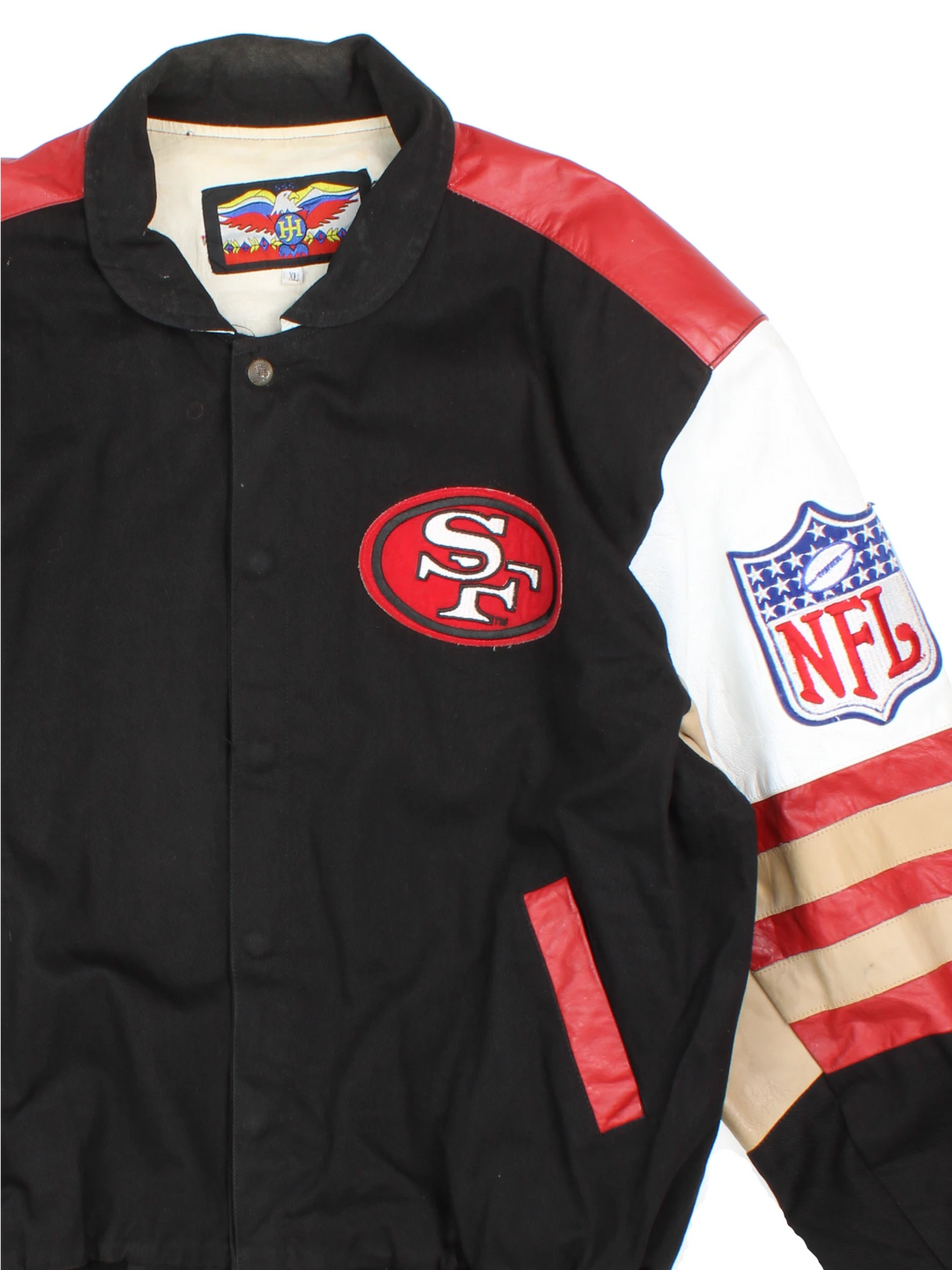 San Francisco 49s, NFL, Jeff Hamilton bomber-style pro sport jacket in a black colourway with white, red and tan detail. Zip closure with team logos embroidered on the front and back.