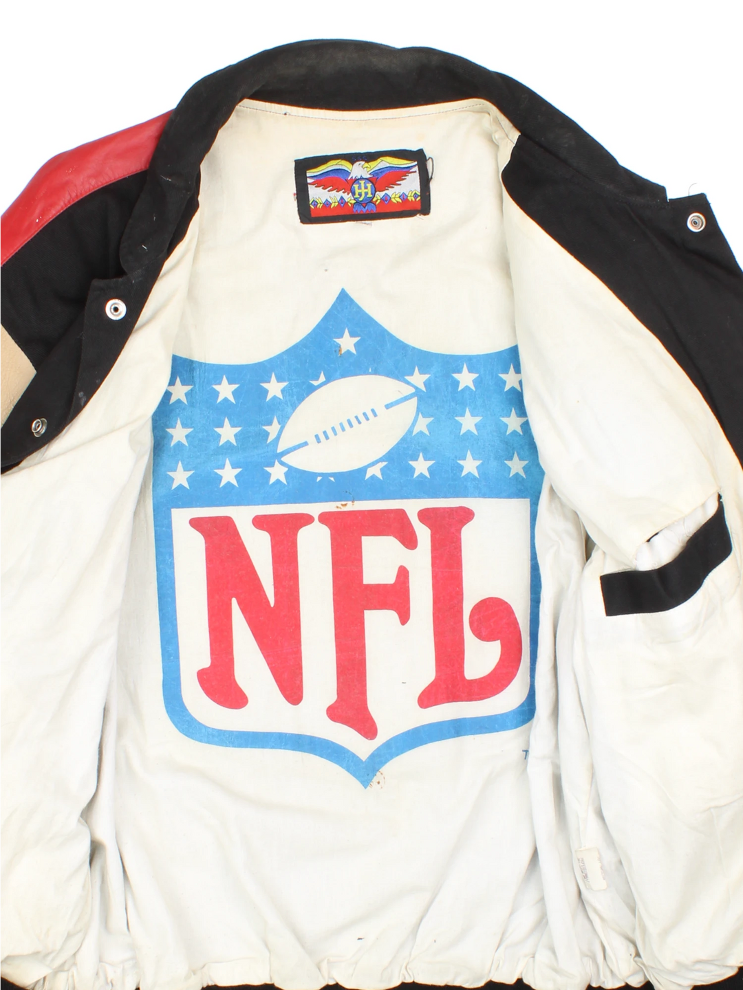 San Francisco 49s, NFL, Jeff Hamilton bomber-style pro sport jacket in a black colourway with white, red and tan detail. Zip closure with team logos embroidered on the front and back.