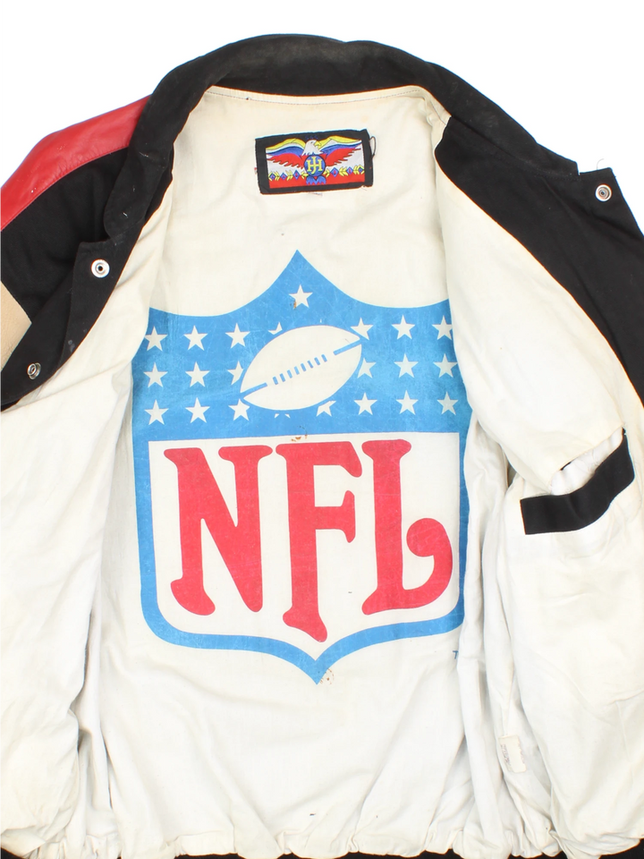 San Francisco 49s, NFL, Jeff Hamilton bomber-style pro sport jacket in a black colourway with white, red and tan detail. Zip closure with team logos embroidered on the front and back.