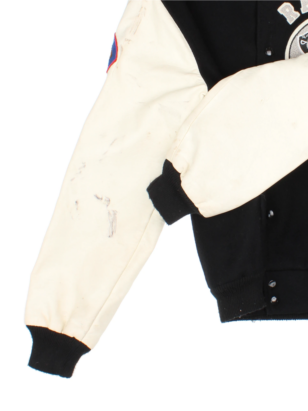 Vintage NFL Oakland Raiders Pro-Sport bomber jacket with embroidered team graphic on the front and back