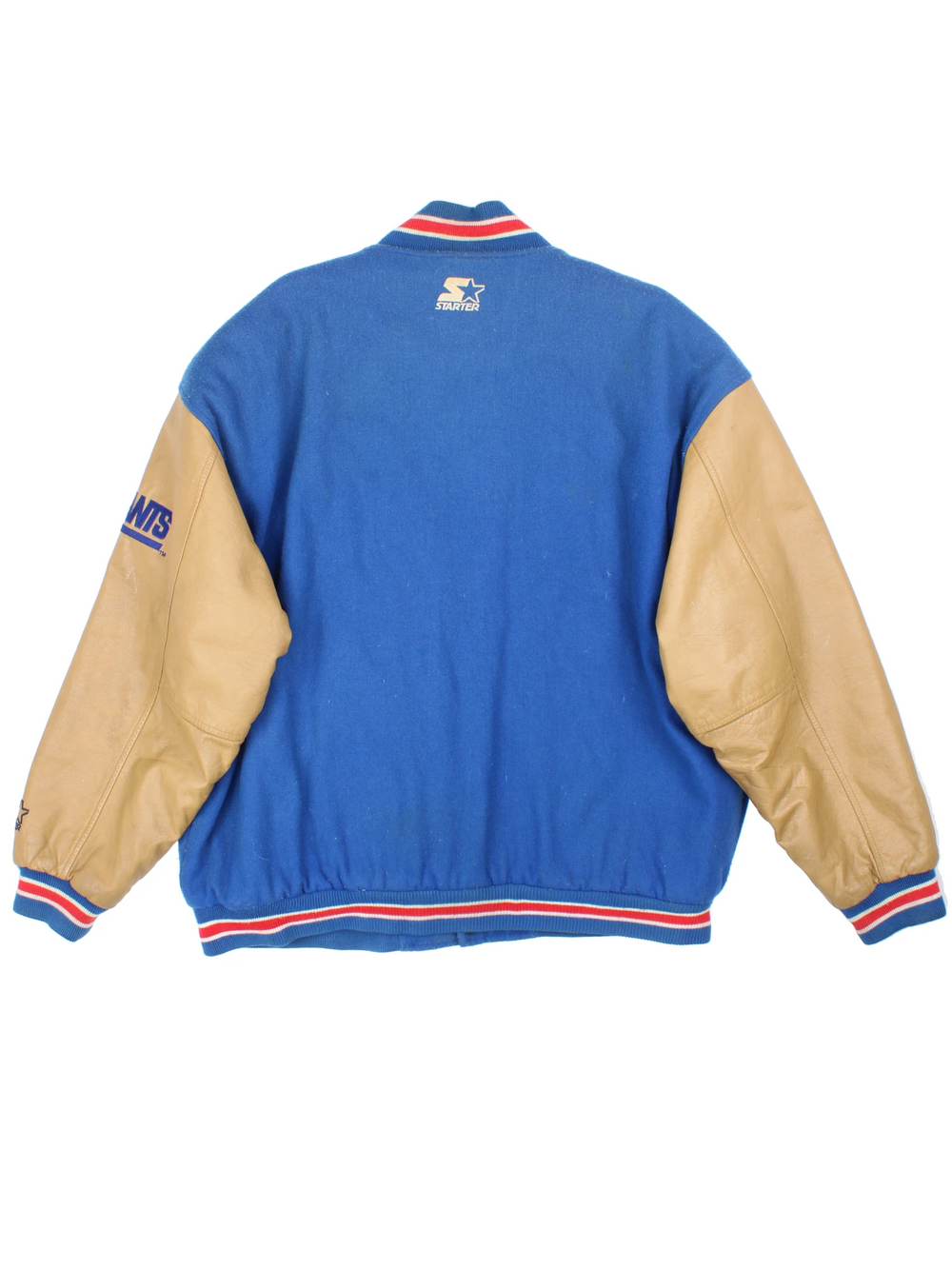 90's New York Giants varsity jacket with blue wool body and tan leather arms. Features embroidered logos on the arms and felt applique logo across the chest  good condition - Discoloration around the collar and scuffs to the leather on the arms and bobbling through out (see photos) Size in Label: Mens XL 