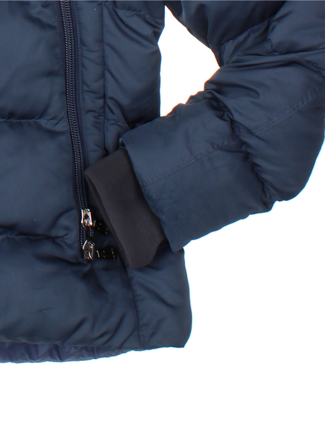 Moncler Cardere down puffer coat in a navy blue colourway. The coat has a puffer lining and the Moncler logo embroidered around the collar. There are extra thermal lined cuffs and a double zip for extra warmth.  