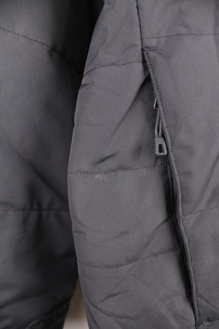 Patagonia puffer coat with printed logo on the chest and sleeve, multiple pockets and removable hood. 