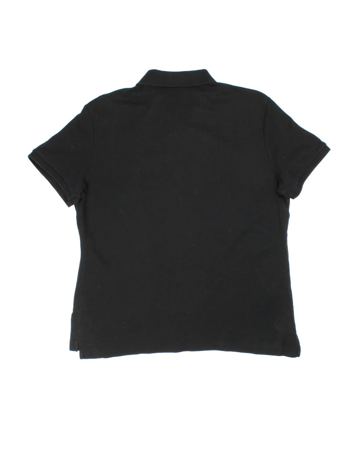 Ralph Lauren Polo Shirt in a black colourway, button up collar with the logo embroidered on the front.