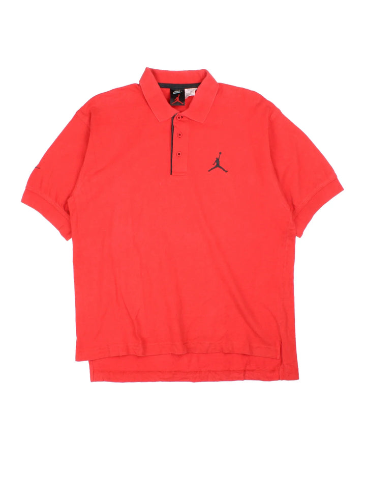 Vintage Nike Air Jordan Polo Shirt in a red colourway with the logo embroidered on the front.