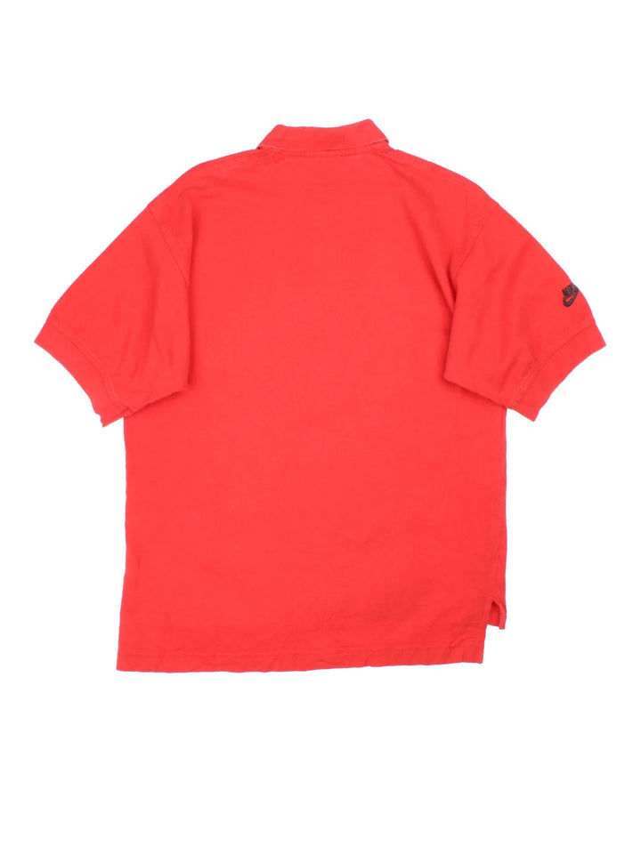 Vintage Nike Air Jordan Polo Shirt in a red colourway with the logo embroidered on the front.
