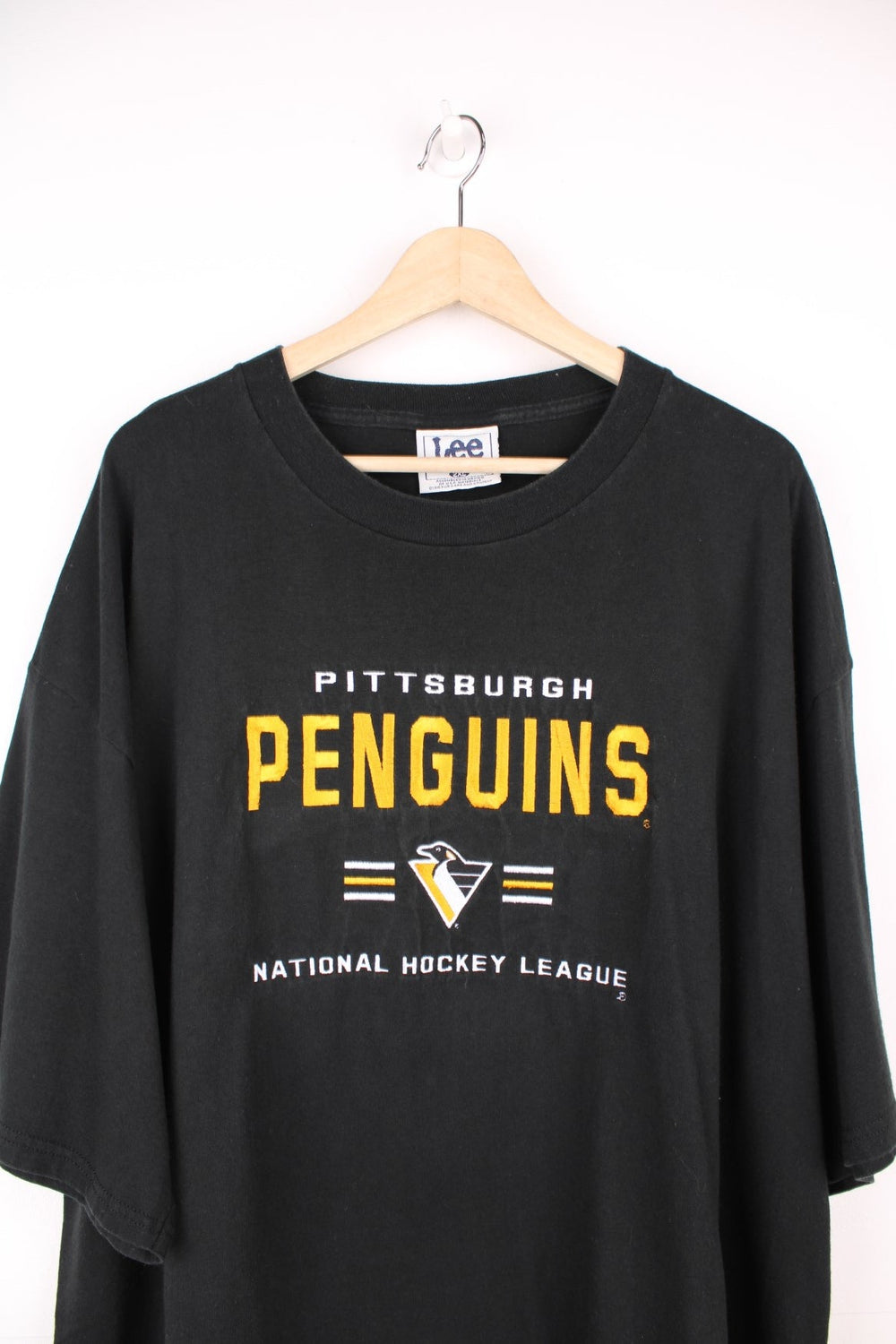 Pittsburgh Penguins T-Shirt by Lee Sport with embroidered logo across the chest.