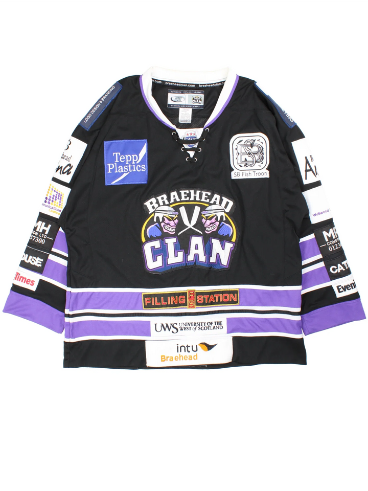 Vintage Braehead Glasgow Clan Ice Hockey Jersey in black/purple colourway, features V neckline, embroidered logos and badges embroidered on the front and back.