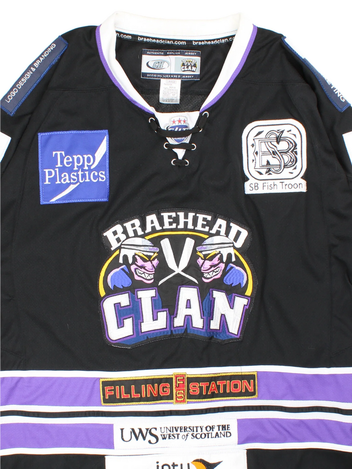 Vintage Braehead Glasgow Clan Ice Hockey Jersey in black/purple colourway, features V neckline, embroidered logos and badges on the front and back.
