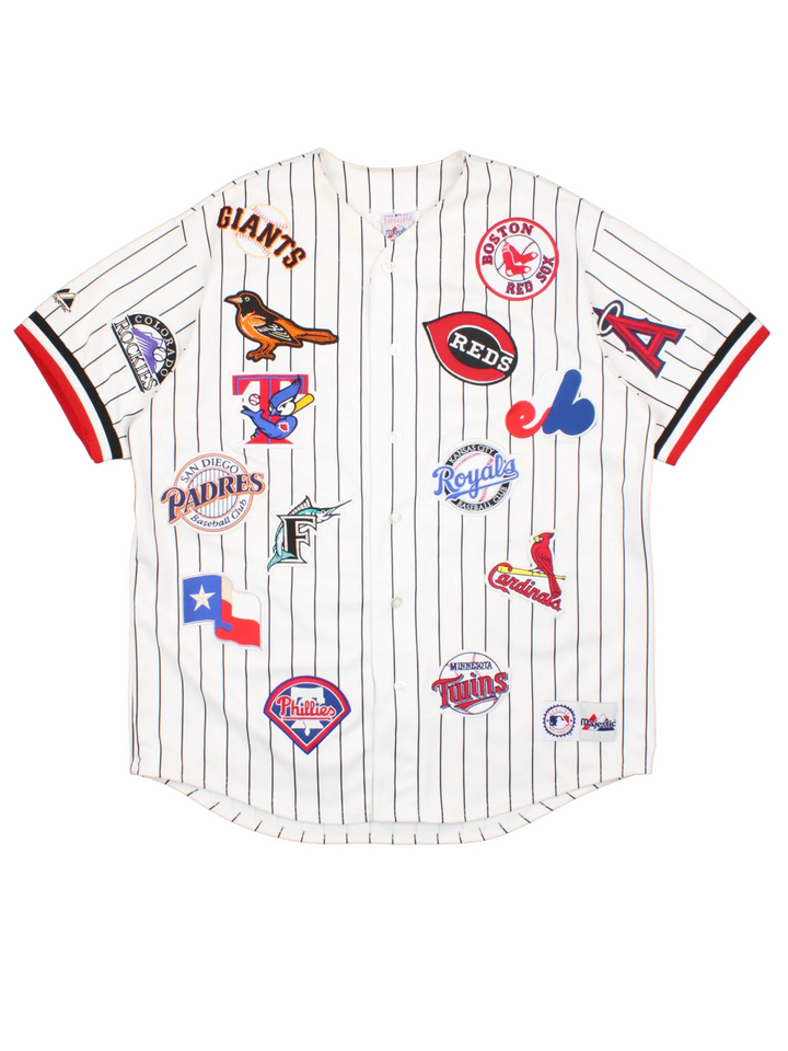 2003 All Star MLB Majestic Baseball Jersey in a white colourway, features embroidered team logo's and patches all over and classic sleeve and stripe detailing.