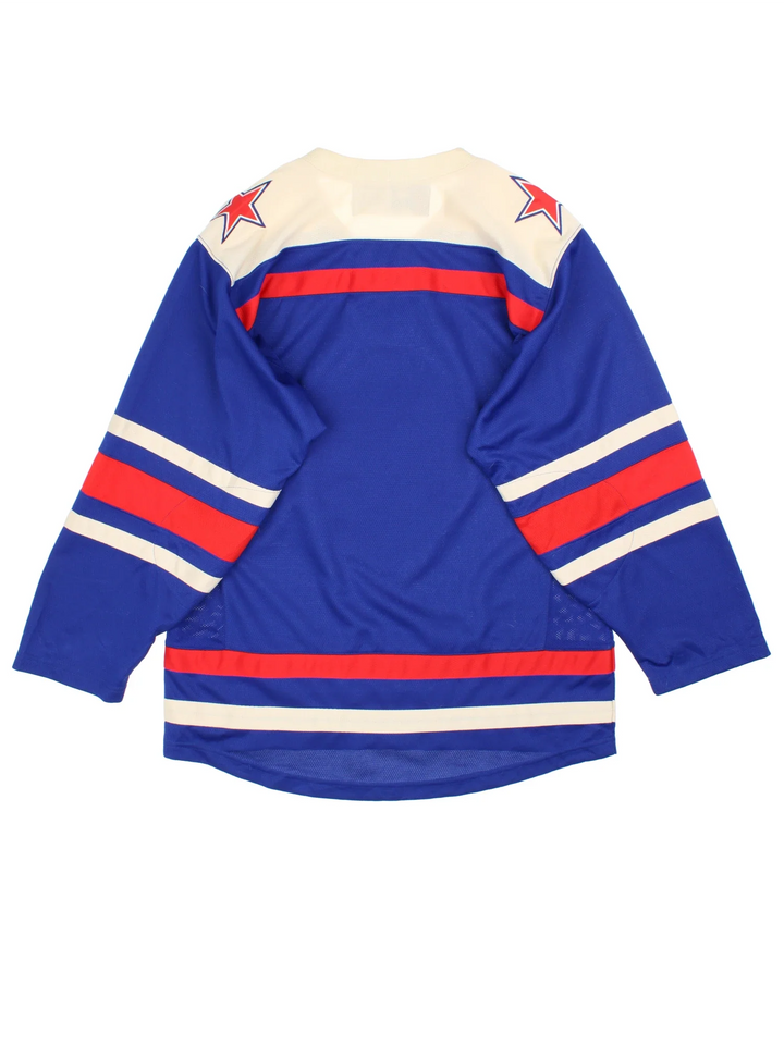 SKA St.Petersburg Vintage Ice Hockey Jersey in a blue colourway with red and white stripe detailing. Features embroidered logos and badge on the front with lace up around the collar.