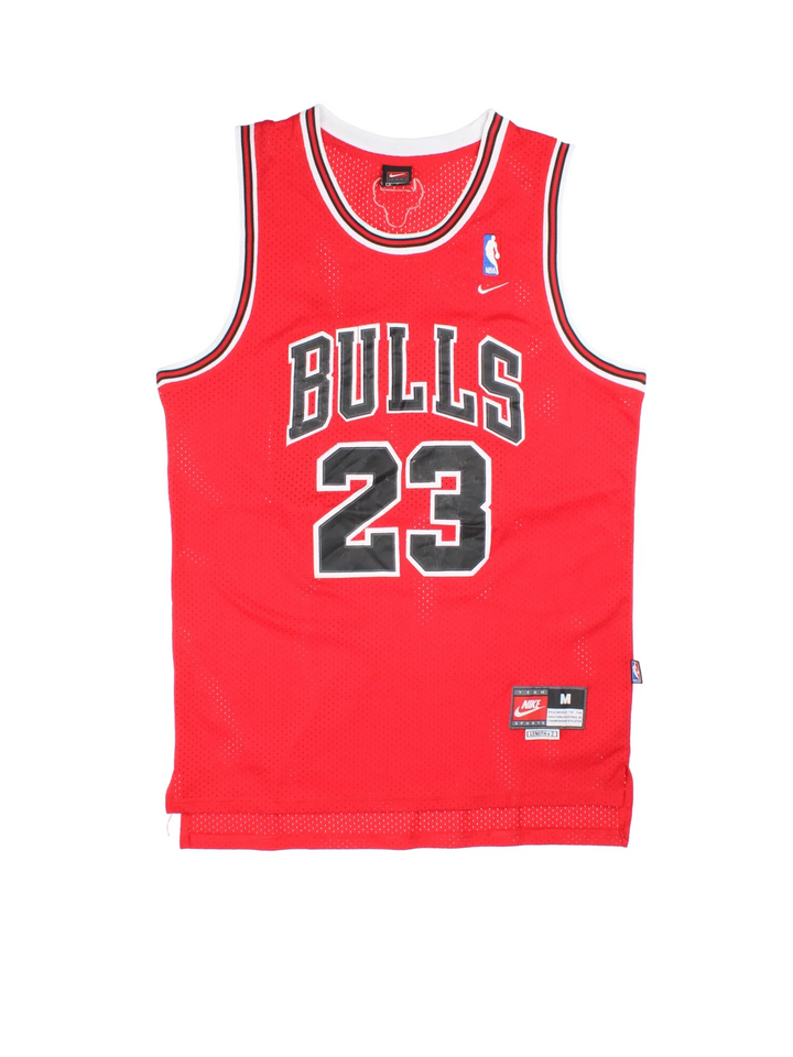 Nike NBA Chicago Bulls Michael Jordan 23 Jersey in the red kit colourway, features embroidered logos and badge on the front and Jordan 23 on the back.