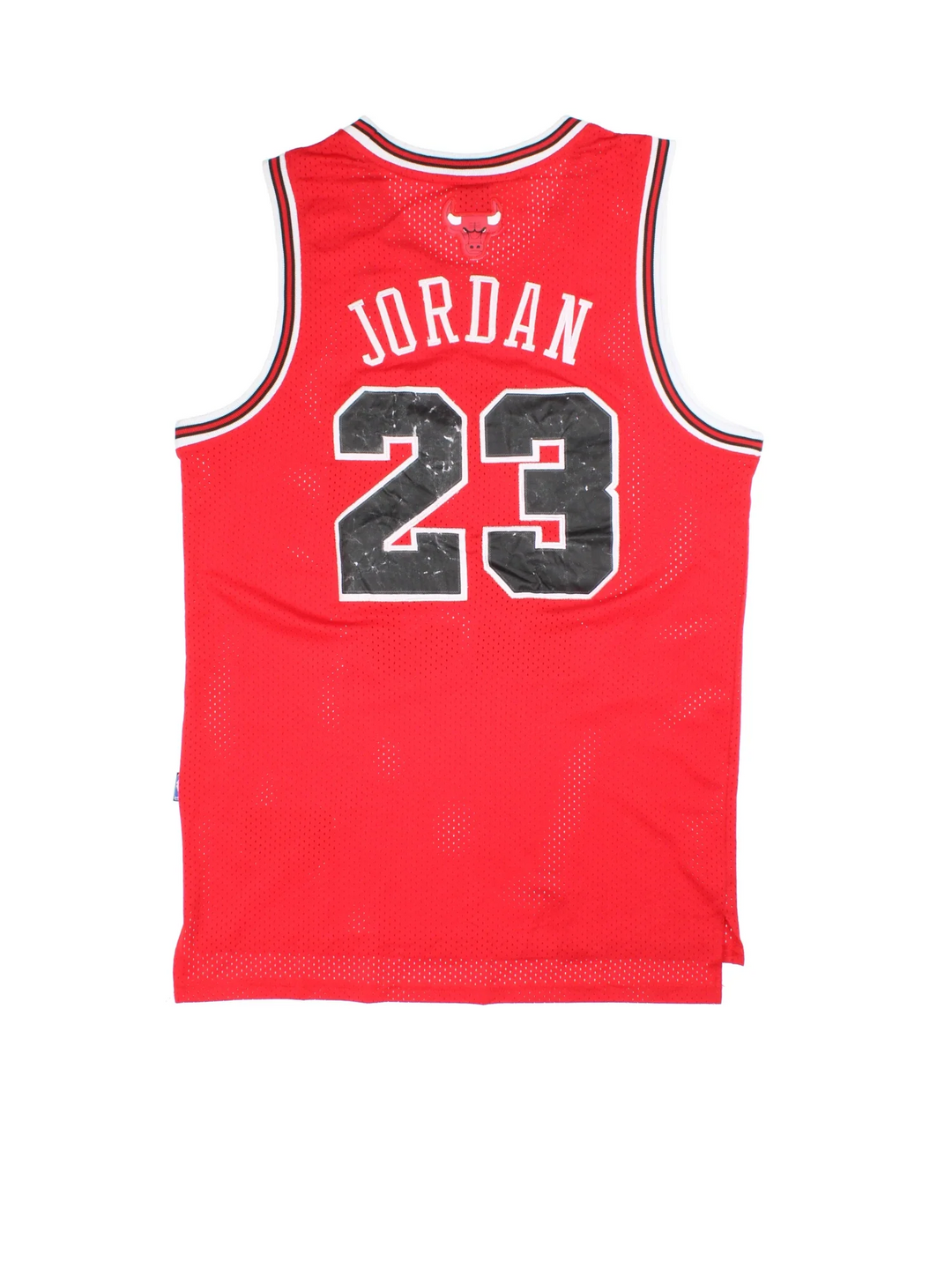 Nike NBA Chicago Bulls Michael Jordan 23 Jersey in the red kit colourway, features embroidered logos and badge on the front and Jordan 23 on the back.
