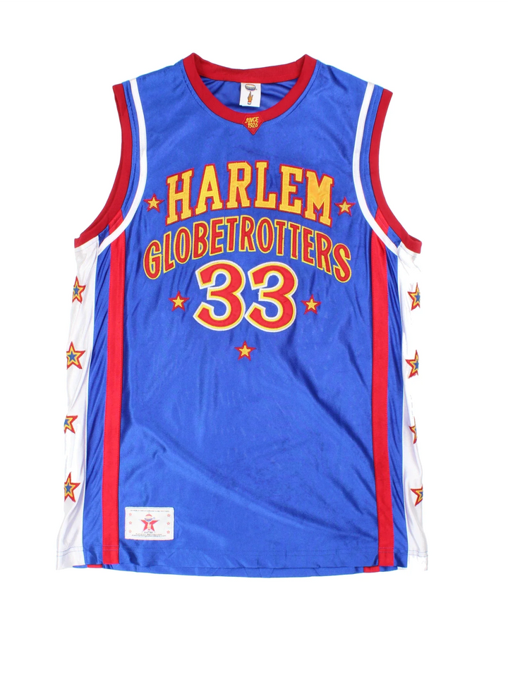 Harlem Globetrotters NBA Jersey in a blue colourway, features embroidered logos and badge on the front with player name BULL #33 on the back. Red and white stripe detailing and stars running down the side.