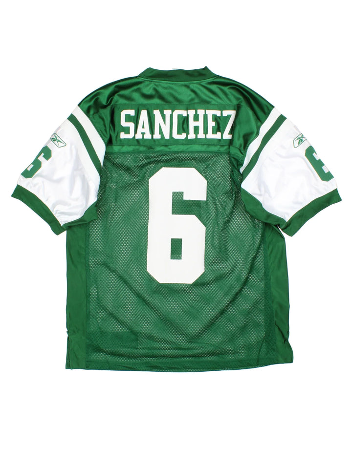 New York Jets Reebok NFL Jersey in a green colourway, features logos and number on the front with white stripe detailing on the sleeves and player name SANCHEZ #6 on the back.