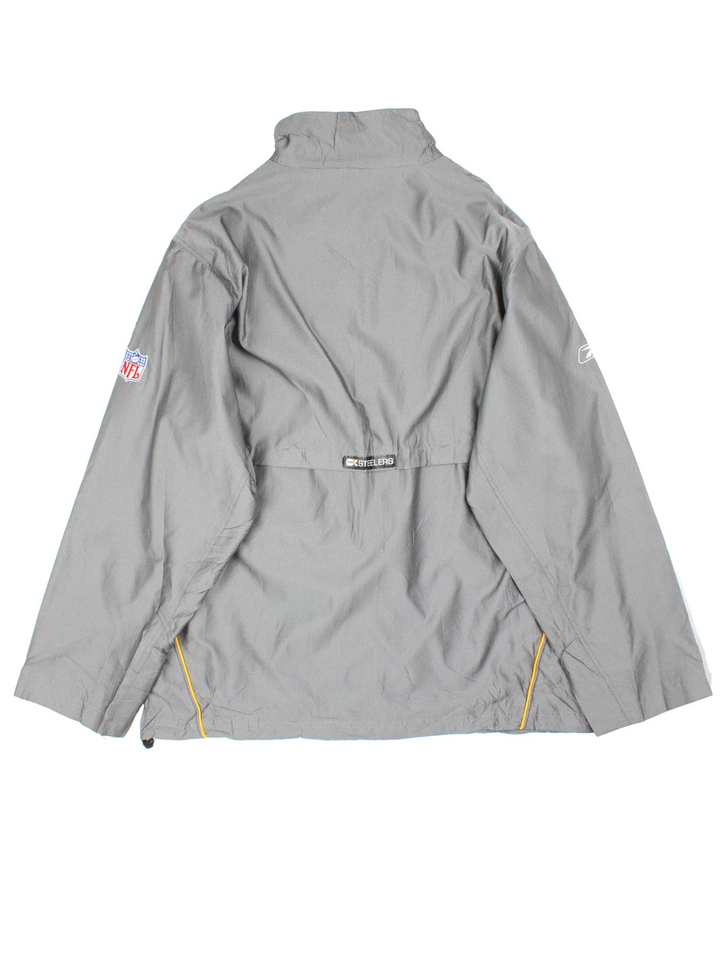 Reebok Pittsburgh Steelers Jacket in a grey colourway with yellow trim detailing, Full zip up with multiple pockets. Small logo's on the front and sleeves.