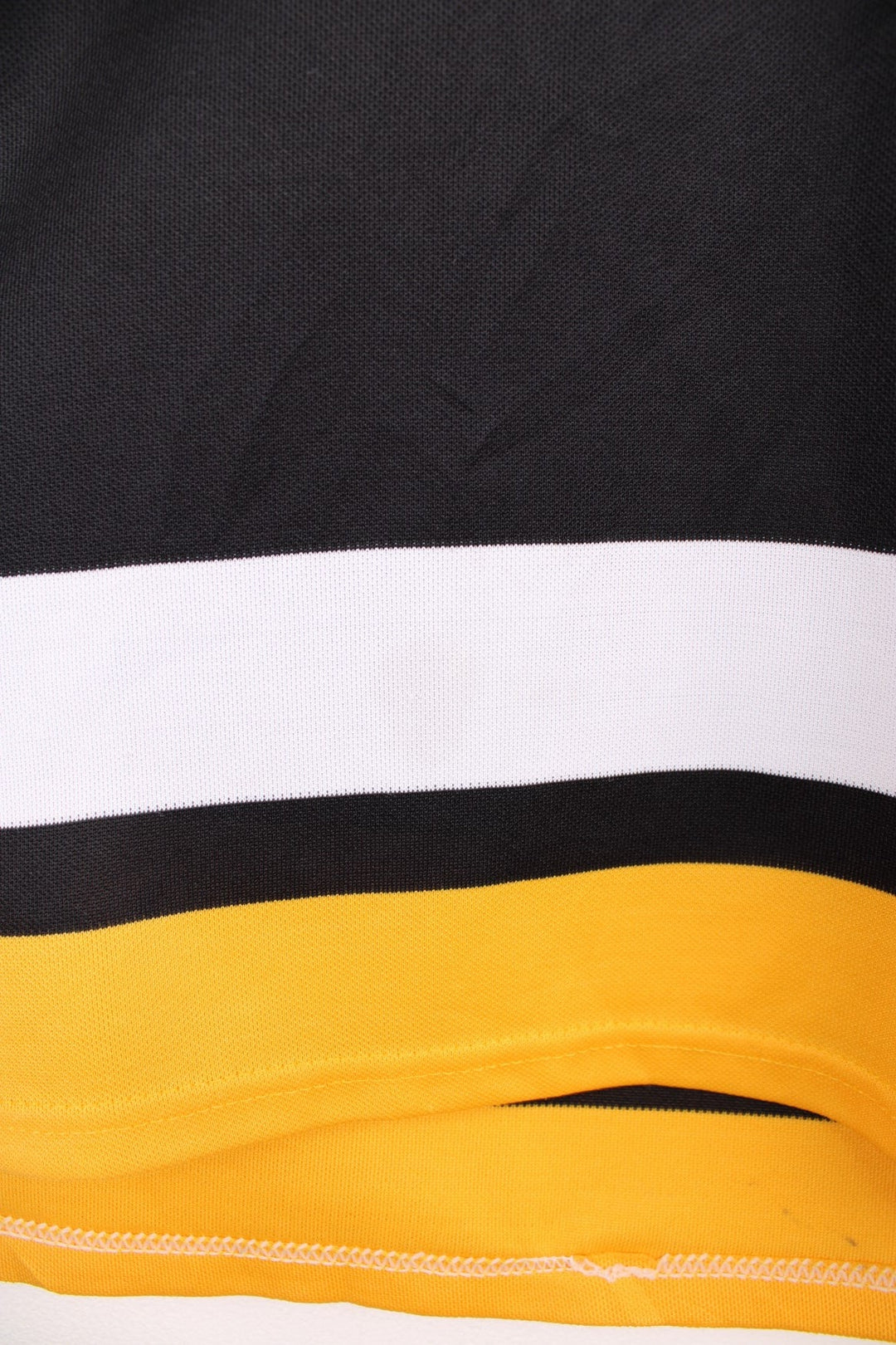90s Pittsburgh Penguins CCM, NHL hockey jersey in a black, white and yellow colourway.