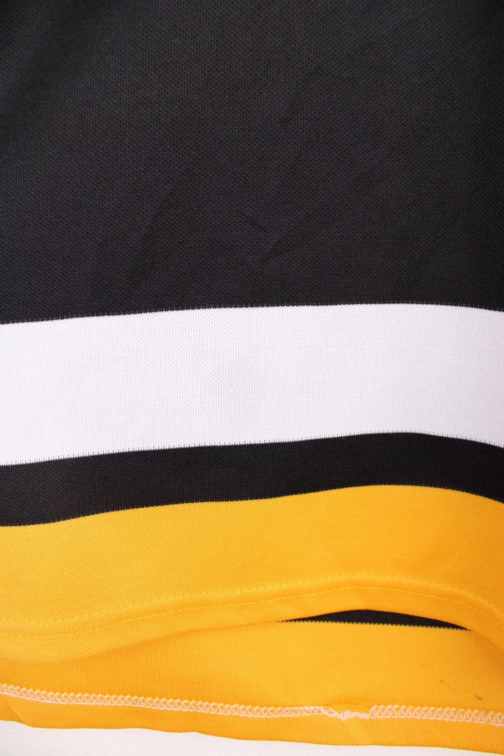90s Pittsburgh Penguins CCM, NHL hockey jersey in a black, white and yellow colourway.