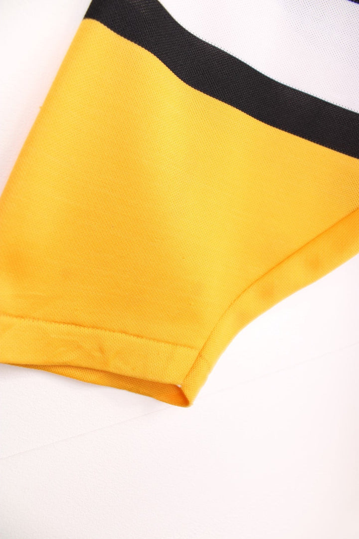 90s Pittsburgh Penguins CCM, NHL hockey jersey in a black, white and yellow colourway.