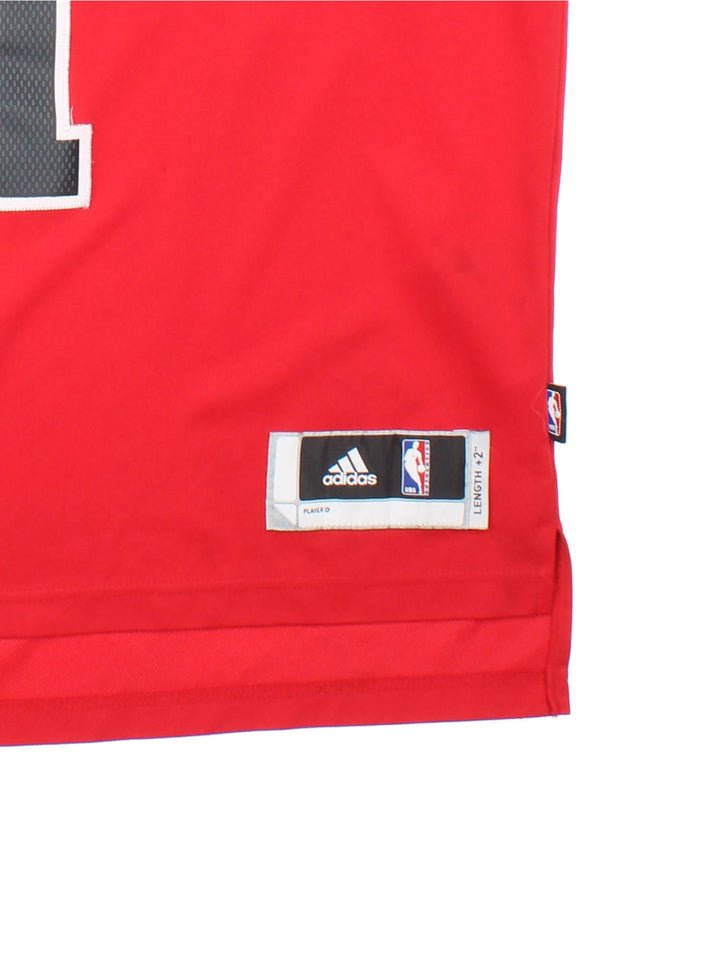 Chicago Bulls Adidas NBA Jersey in red colourway, features embroidered logos and badge on front and back.