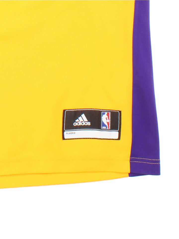 Kobe Bryant Los Angeles Lakers Adidas NBA Jersey in yellow colourway, features embroidered logos and badge on front and back.