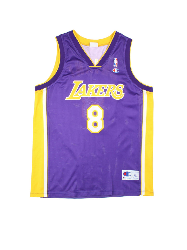 90's Kobe Bryant Los Angeles Lakers Champion NBA Jersey in purple colourway, features embroidered logos and badge on front and back.