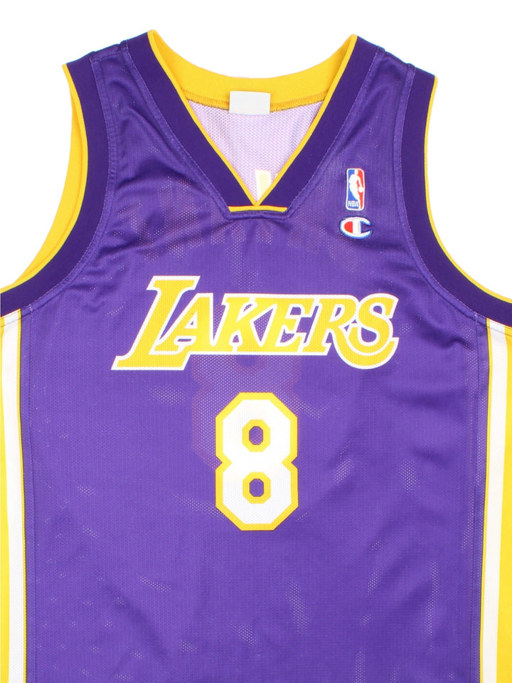 90's Kobe Bryant Los Angeles Lakers Champion NBA Jersey in purple colourway, features embroidered logos and badge on front and back.