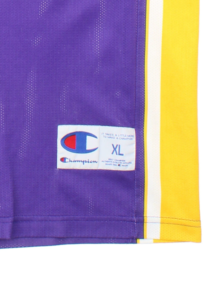 90's Kobe Bryant Los Angeles Lakers Champion NBA Jersey in purple colourway, features embroidered logos and badge on front and back.