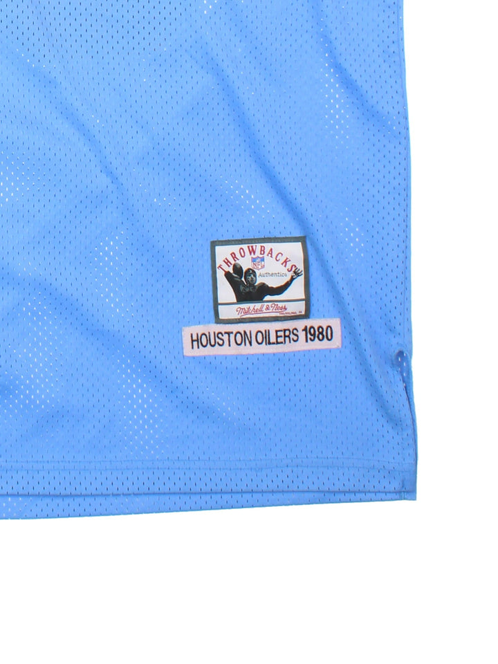80's Mitchell & Ness Houston Oilers  Jersey in  colourway, features embroidered logos on front and back.
