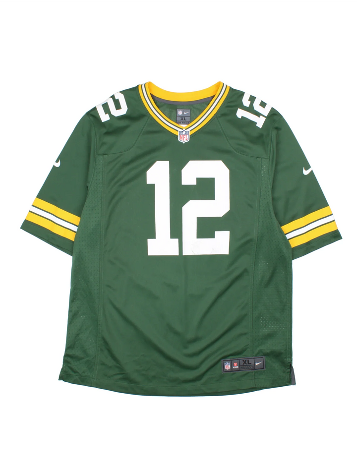 Green Bay Packers Nike NFL Jersey in the green home kit colourway, features RODGERS #29 on the back and classic yellow trim around the collar and sleeves.