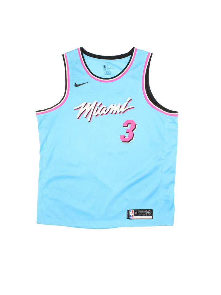 Miami Heat Nike Dwayne Wade NBA Jersey in the blue neon colourway with pink trim, features embroidered logos and badge on the front with WADE #3 on the back..
