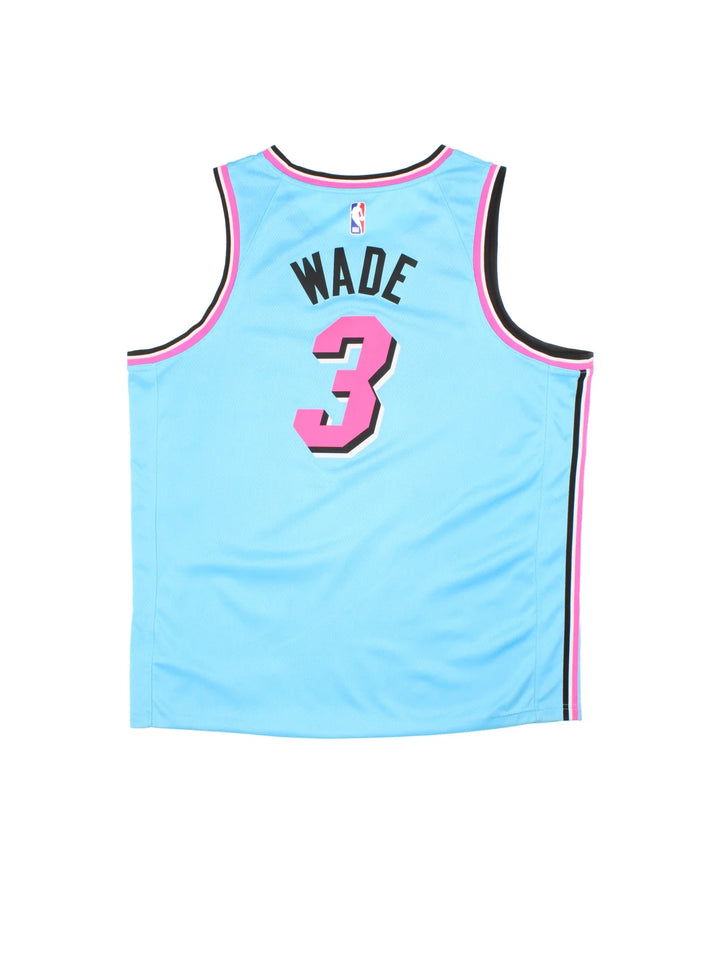 Miami Heat Nike Dwayne Wade NBA Jersey in the blue neon colourway with pink trim, features embroidered logos and badge on the front with WADE #3 on the back..