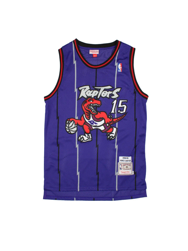 Toronto Raptors Vintage 1998-99 Vince Carter Hardwood Classics NBA Jersey in the purple colourway with black and red detailing, features embroidered raptor logo and badge on the front and CARTER #15 on the back.