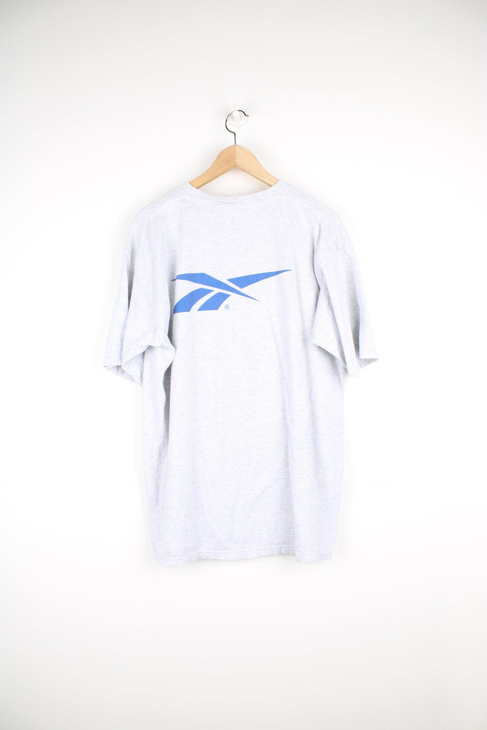 Vintage Reebok Teaneck Softball single stitch T-Shirt in grey, with blue print on the front and back.