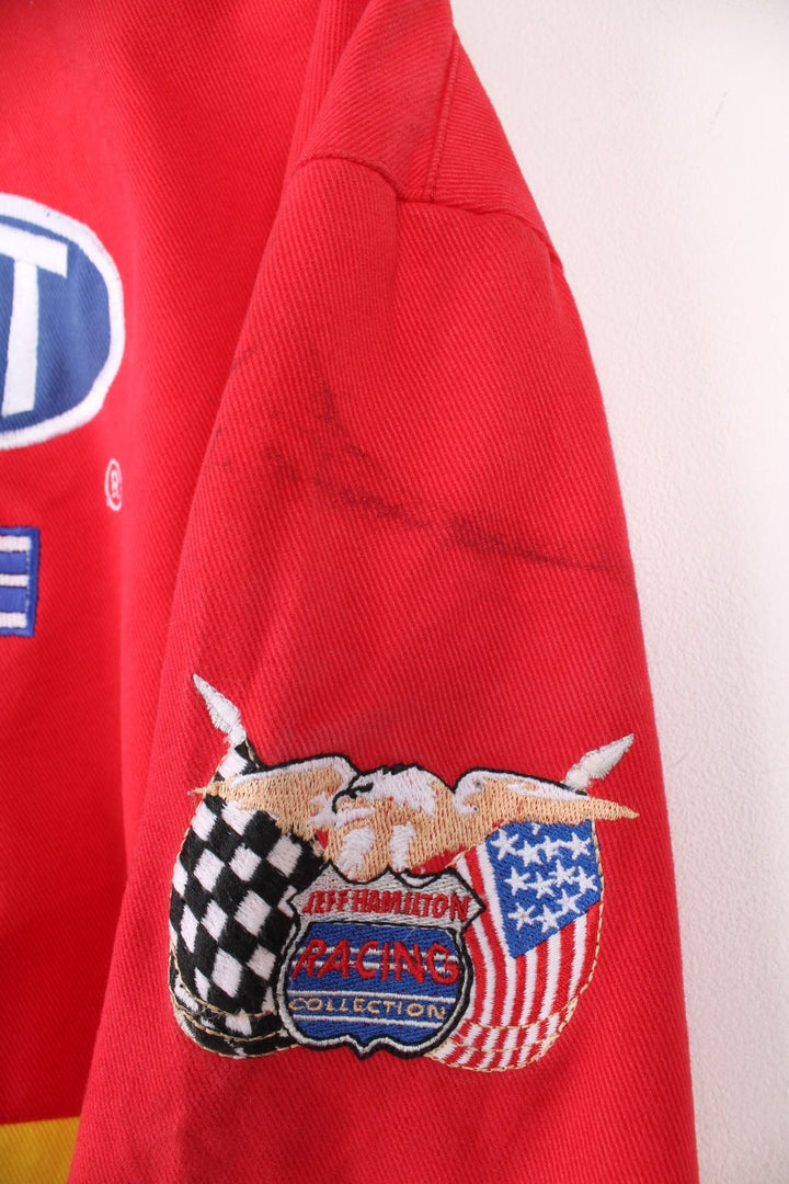 Vintage Jeff Gordon Du Pont, NASCAR bomber jacket in red, yellow, green and blue. Features embroidered badges.