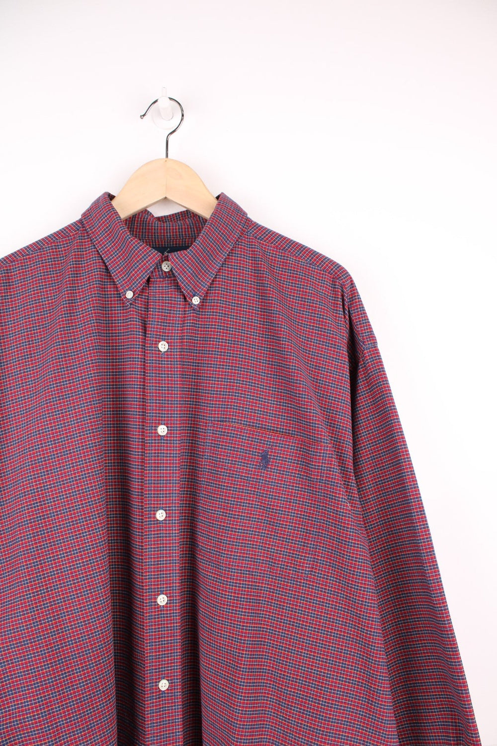 Red and navy blue check Ralph Lauren button-down shirt with a breast pocket and signature Polo logo embroidered in navy blue. 