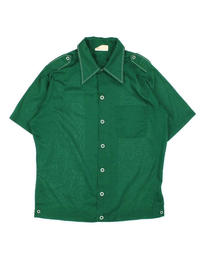 Vintage 70's Shirt in a green colourway, button up with front pocket, contrast stitching and dagger collar.