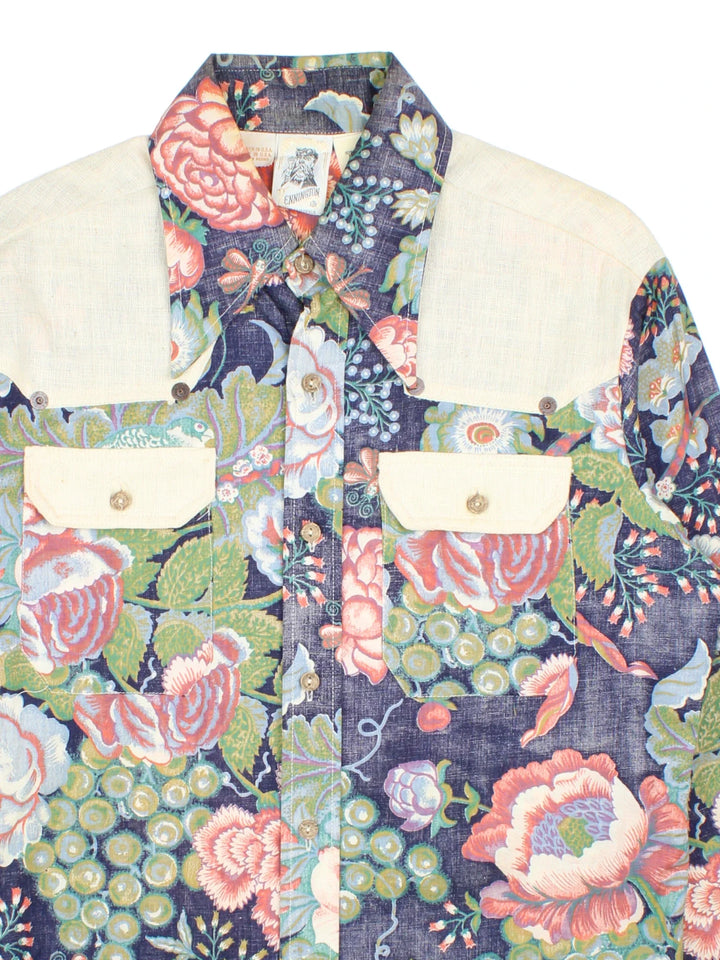 Vintage 70's Kennington Shirt in a floral blue colourway. Button up with front patch pockets, contrast beige detail and dagger collar.