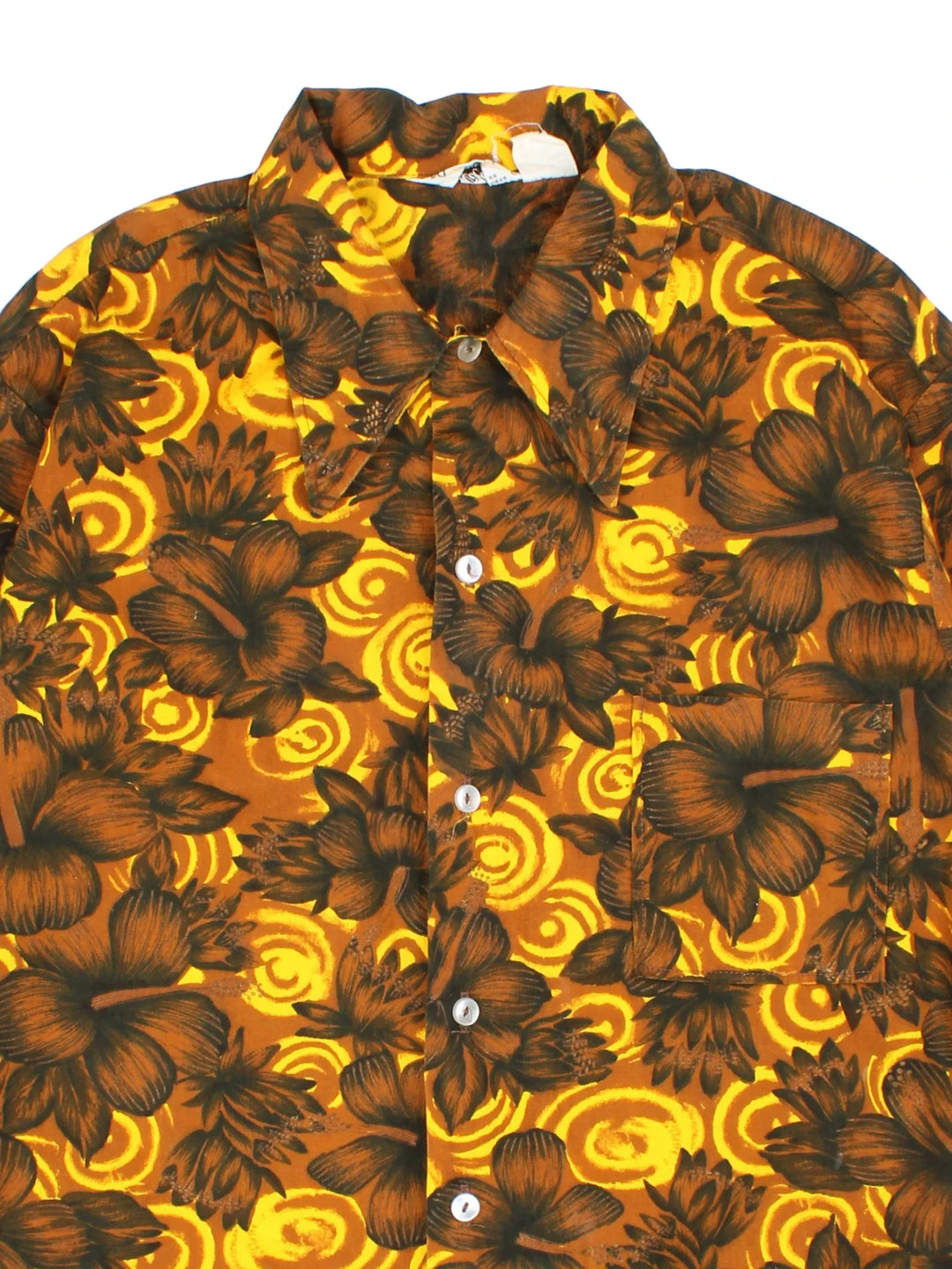 Vintage Hawaiian Shirt in a brown floral colourway. Button up fastening, with front patch pocket and dagger collar.
